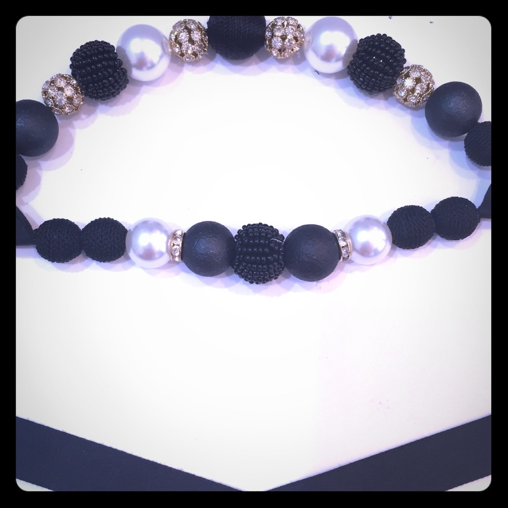Ann Taylor F,  black, white and gold necklace.